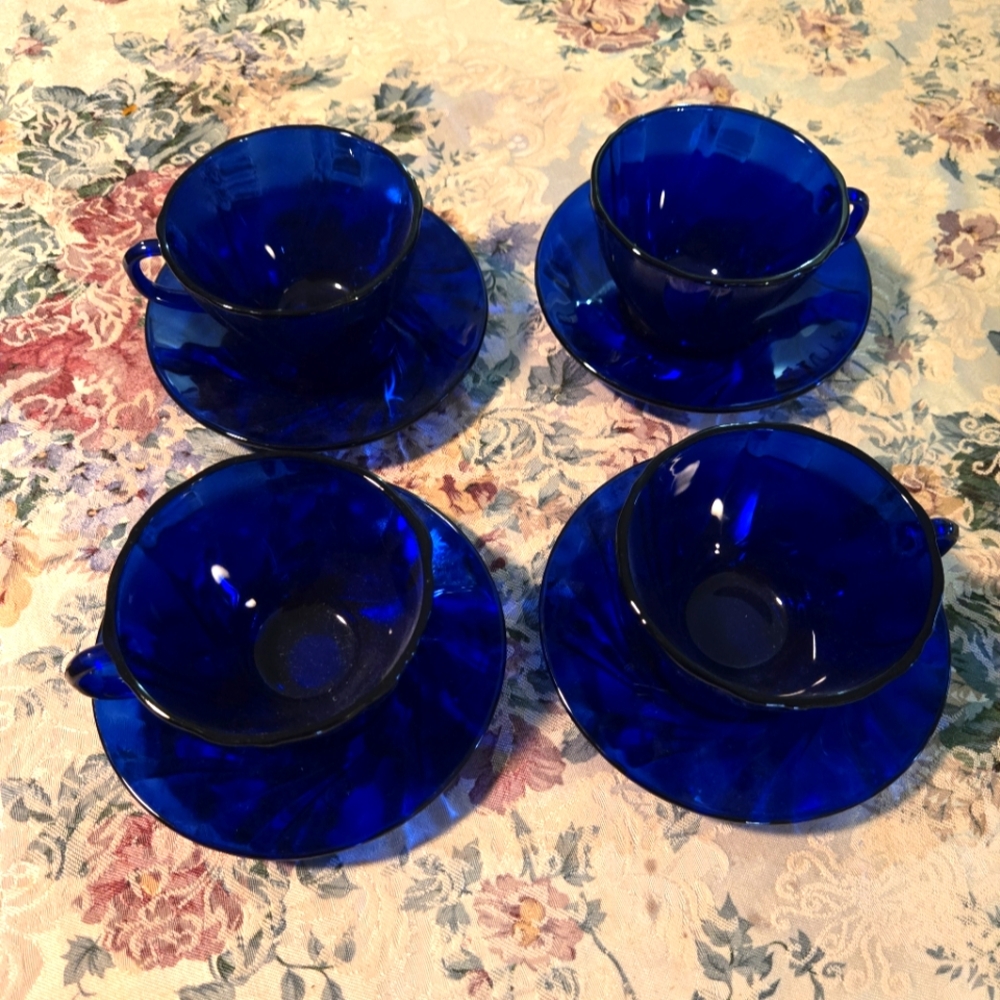 Set of Four Blue Colbalt Glass Teacups with Saucers.
